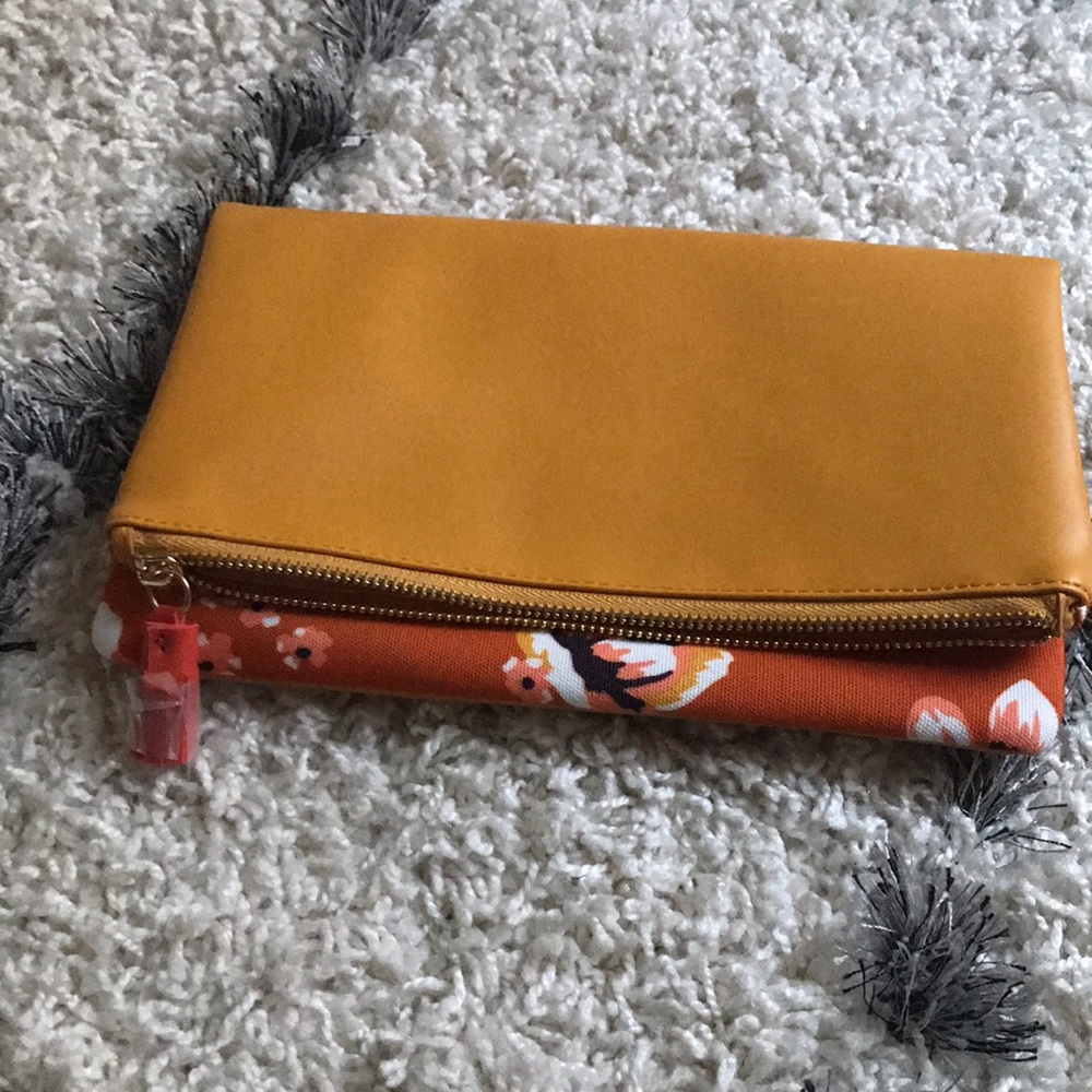 Rachel Pally reversible clutch